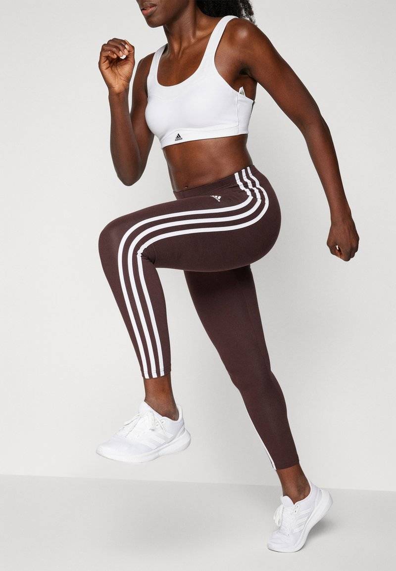 adidas Sportswear adidas Sportswear ESSENTIALS 3 STRIPES HIGH WAISTED - Leggings - shadow brown Letzter Tag