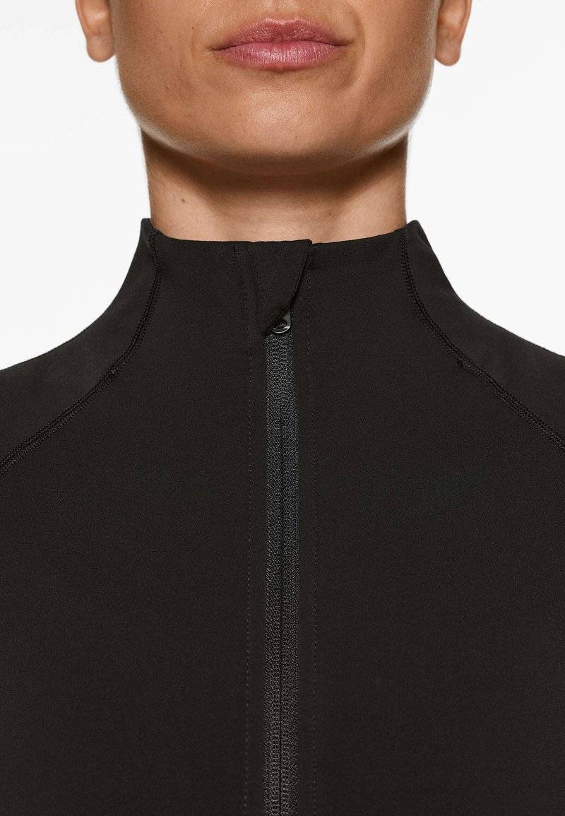 OYSHO OYSHO WARMTH COMFORTLUX TECHNICAL - Training jacket - black Nur noch ein Tag übrig