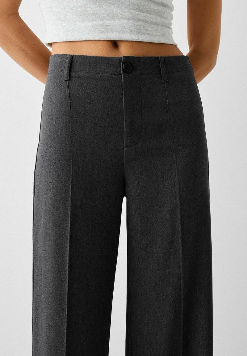 Bershka Bershka WIDE TAILORED - Trousers - mottled dark grey Günstig kaufen