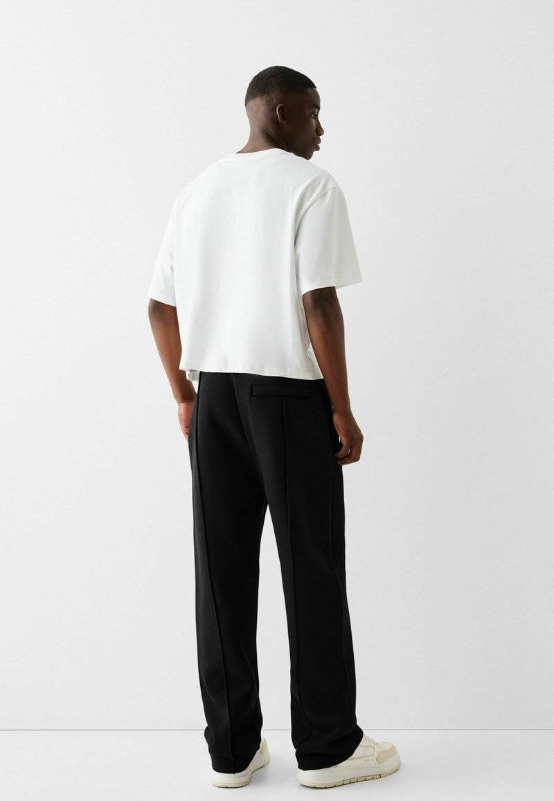 Bershka Bershka WIDE - Tracksuit bottoms - black Begrenztes Angebot