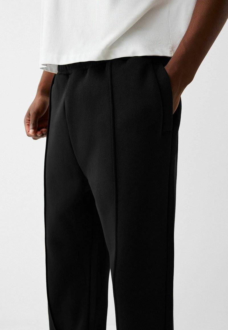 Bershka Bershka WIDE - Tracksuit bottoms - black Begrenztes Angebot