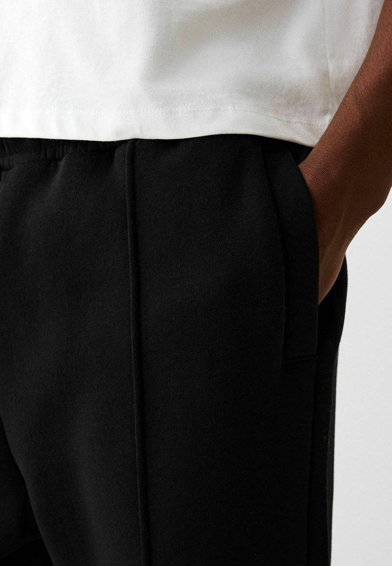 Bershka Bershka WIDE - Tracksuit bottoms - black Begrenztes Angebot