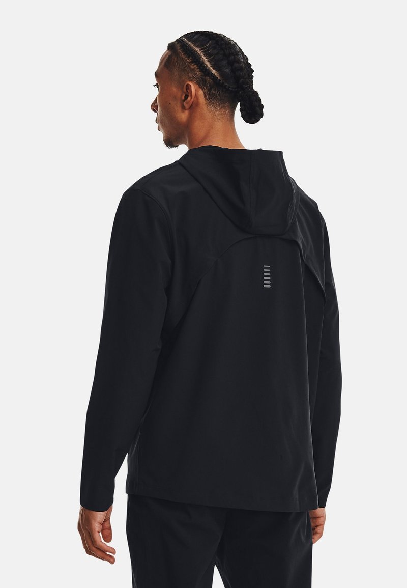 Under Armour Under Armour OUT THE STORM - Running jacket - black jet gray reflective Kostenlose Rückgabe