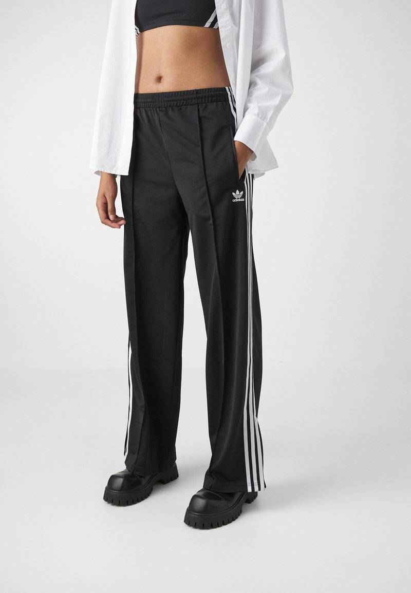 adidas Originals adidas Originals FBIRD LOOSE - Tracksuit bottoms - black im Angebot