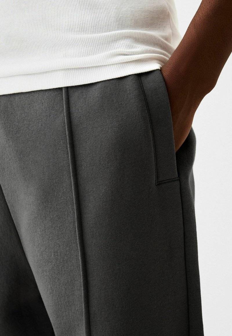 Bershka Bershka WIDE - Tracksuit bottoms - dark grey Fabrik Onlineshop