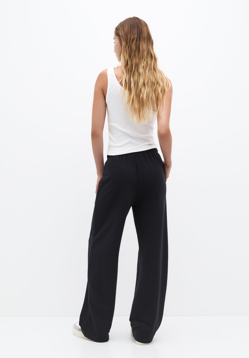 PULL&BEAR PULL&BEAR WIDE-LEG - Tracksuit bottoms - black Online Shopping