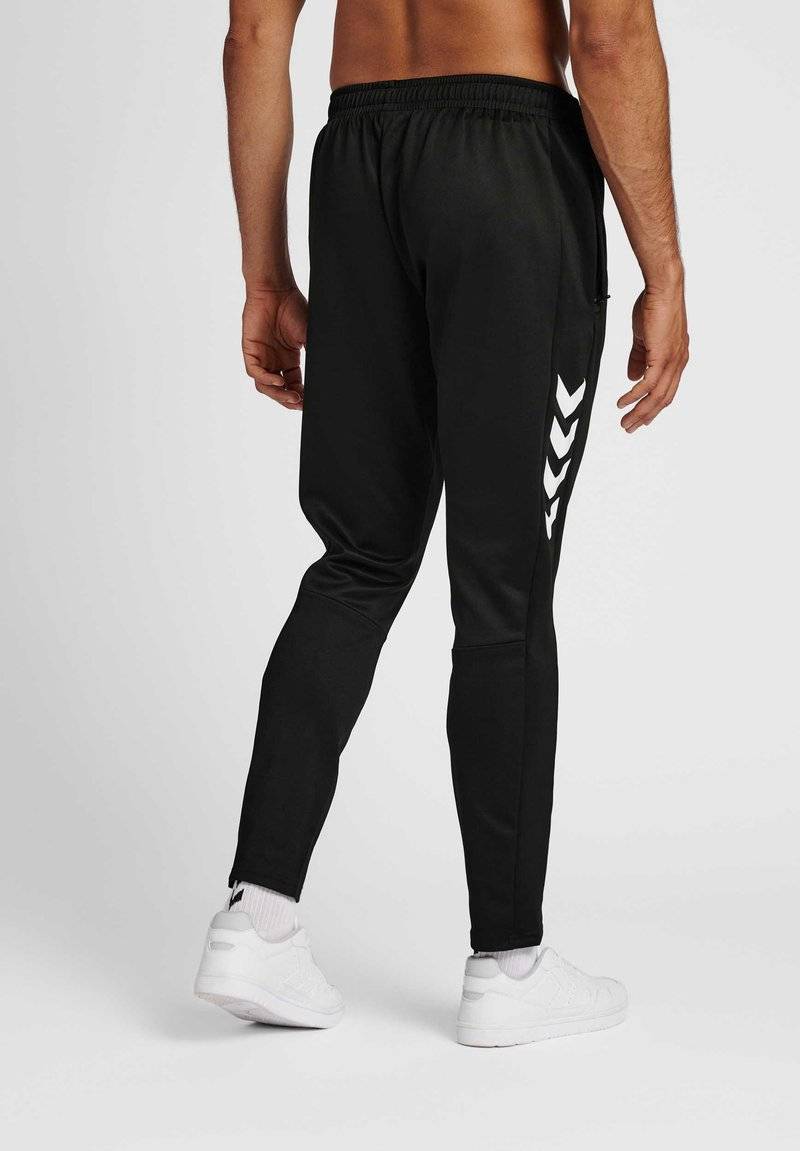 Hummel Hummel CORE XR TRAINING PANTS - Tracksuit bottoms - black Muttertagsangebot