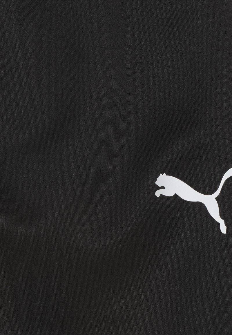 Puma Puma TEAMRISE POLY TRAINING UNISEX - Tracksuit bottoms Tiefpreis