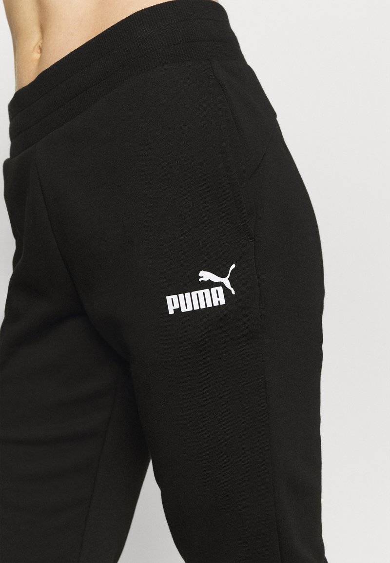 Puma Puma CAPRI - 3/4 sports trousers - black Fabrik Onlineshop
