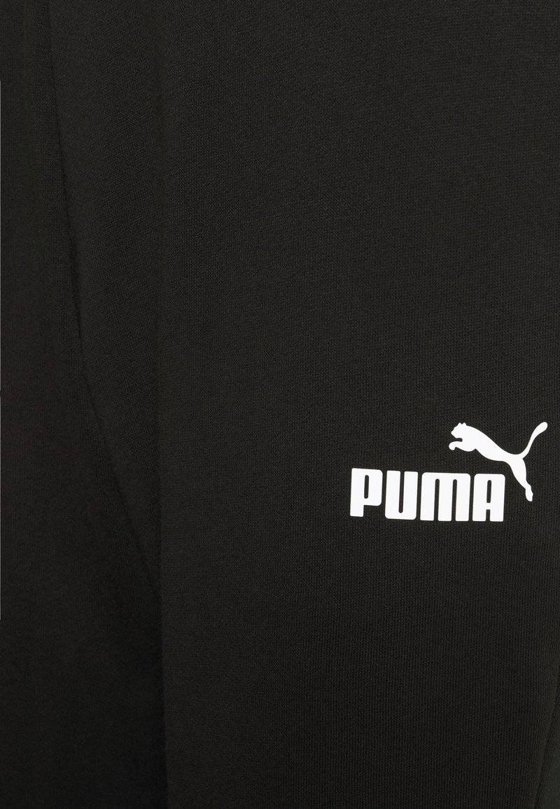 Puma Puma CAPRI - 3/4 sports trousers - black Fabrik Onlineshop