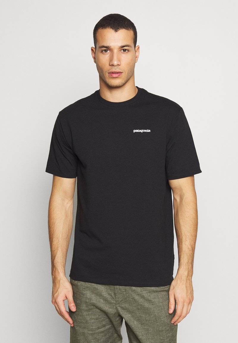 Patagonia Patagonia LOGO TEE - Print T-shirt - black Exklusivangebot