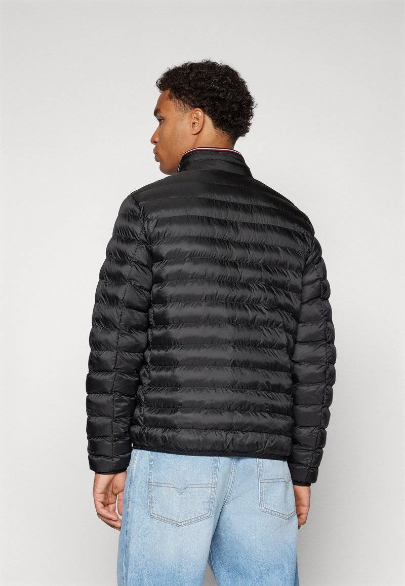 Tommy Hilfiger Tommy Hilfiger PACKABLE - Light jacket - black Muttertagsangebot