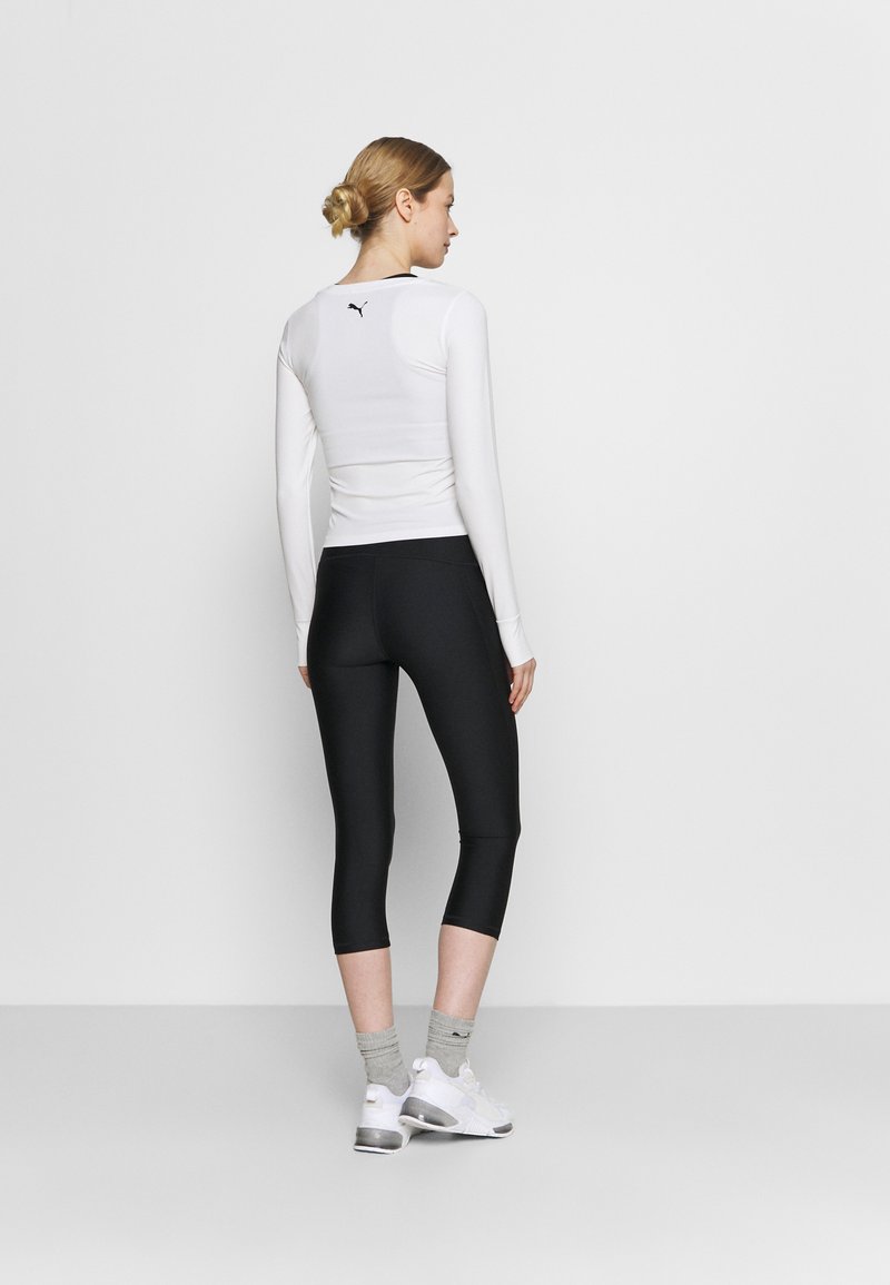 Under Armour Under Armour HI CAPRI - 3/4 sports trousers - black Versandkostenfrei