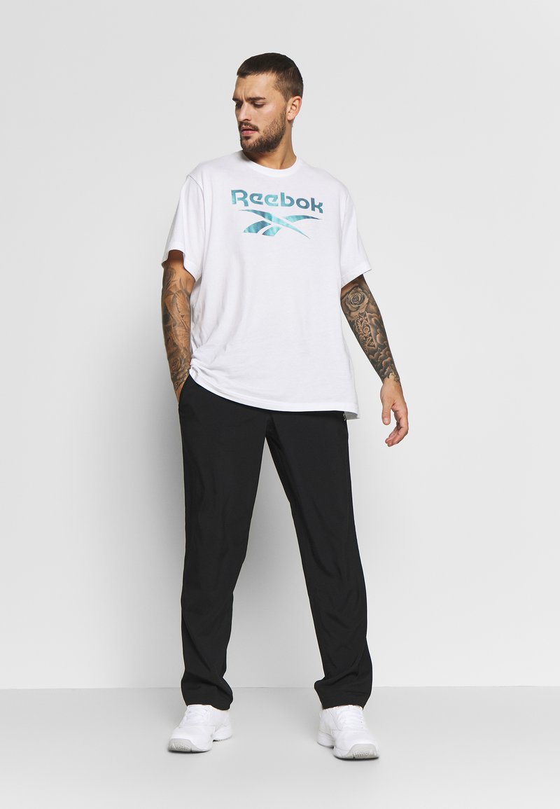 Reebok Reebok TRAINING ESSENTIALS WOVEN SPEEDWICK WORKOUT READY - Trousers - black Lagerräumung