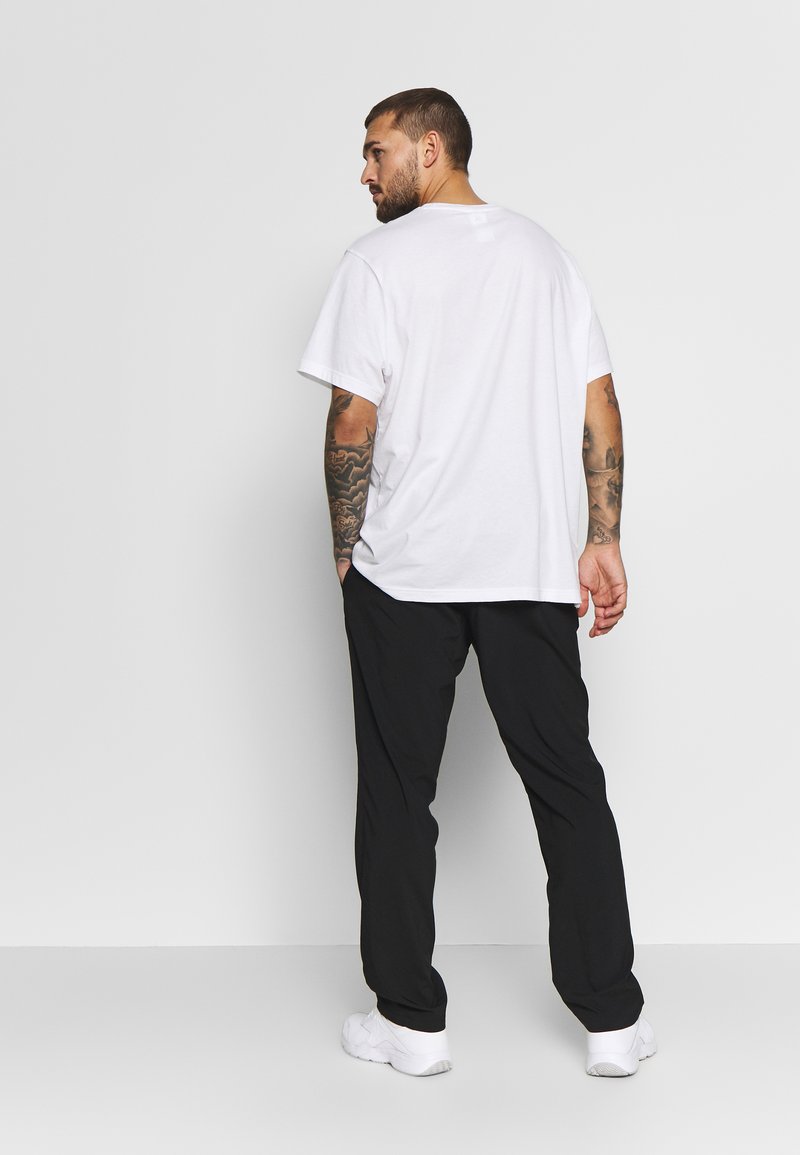Reebok Reebok TRAINING ESSENTIALS WOVEN SPEEDWICK WORKOUT READY - Trousers - black Lagerräumung