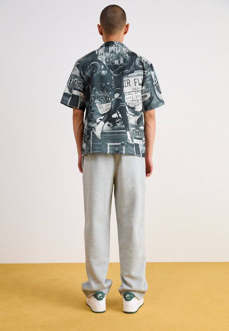 Nike Sportswear Nike Sportswear BUNGIE PANT - Tracksuit bottoms - grey heather Bis zu 65% Rabatt