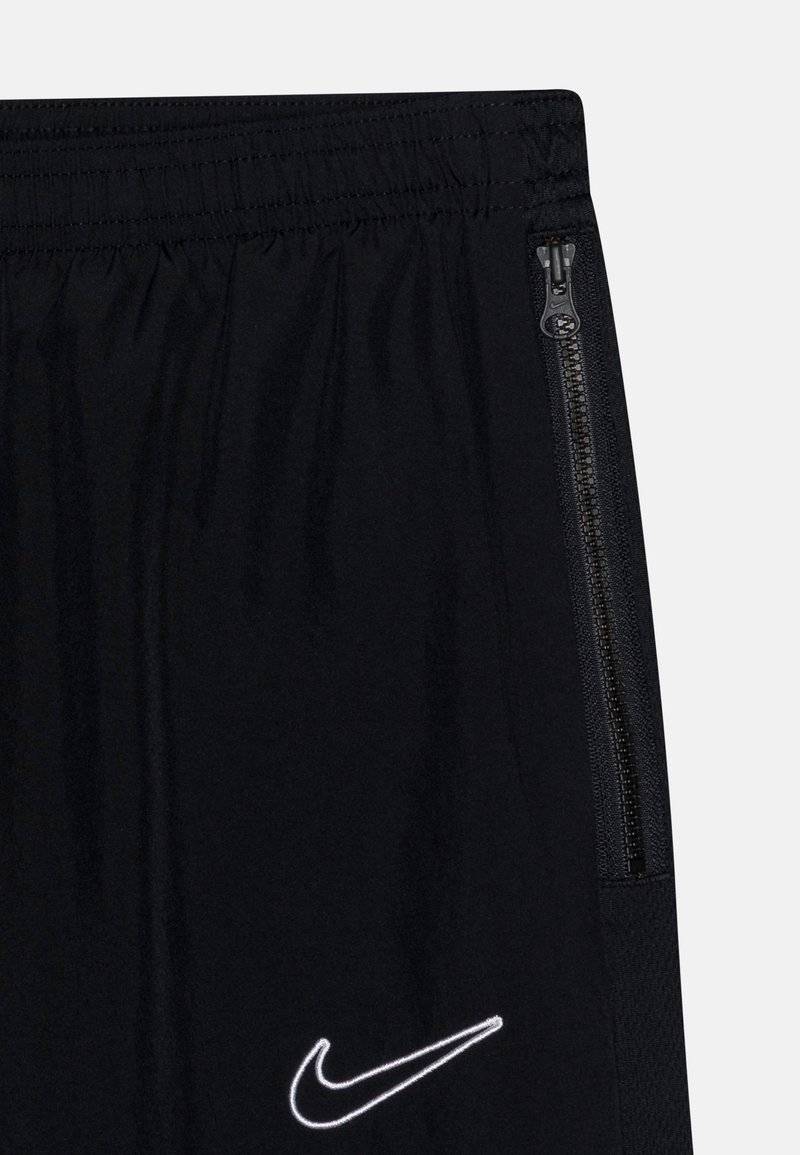 Nike Performance Nike Performance ACADEMY 23 TRACK PANT UNISEX - Tracksuit bottoms Bis zu 55% Rabatt