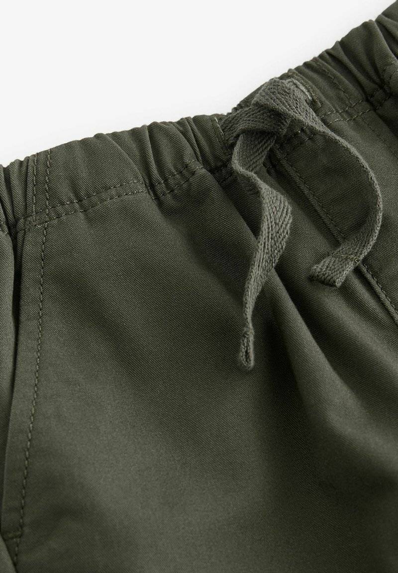 Next Next SIDE POCKET PULL-ON STANDARD - Trousers - khaki green Weihnachtsangebot