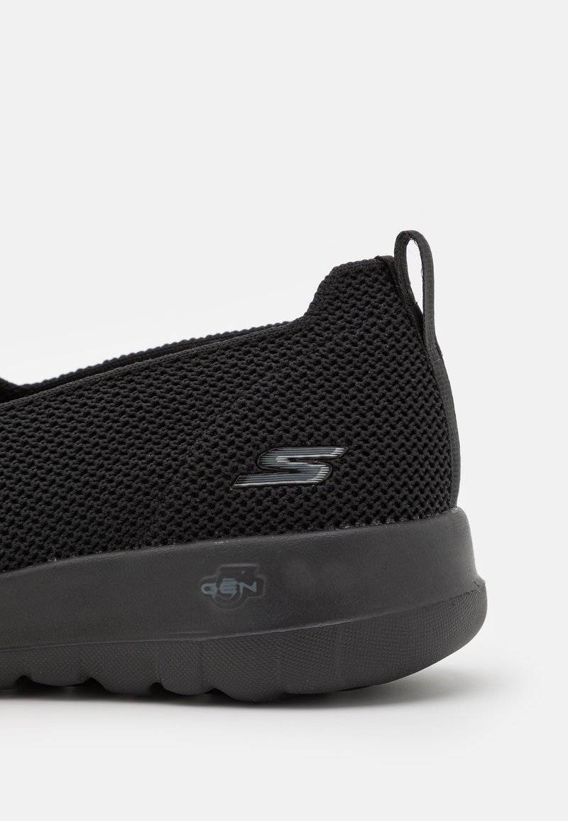 Skechers Performance Skechers Performance GO WALK SLIP ON - Walking trainers - black Bis zu 65% Rabatt