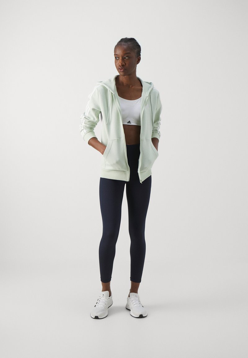adidas Sportswear adidas Sportswear ESSENTIALS 3 STRIPES FULL ZIP HOODIE - Zip-up sweatshirt - linen green Bis zu 55% Rabatt