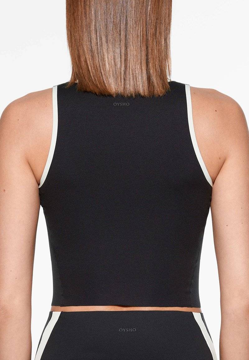 OYSHO OYSHO PERFECT-ADAPT PIPING - Sports T-shirt - black Neueste Stile
