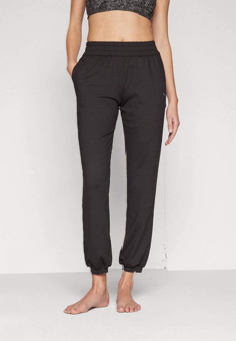 Puma Puma STUDIO FOUNDATIONS - Tracksuit bottoms - black Black Friday