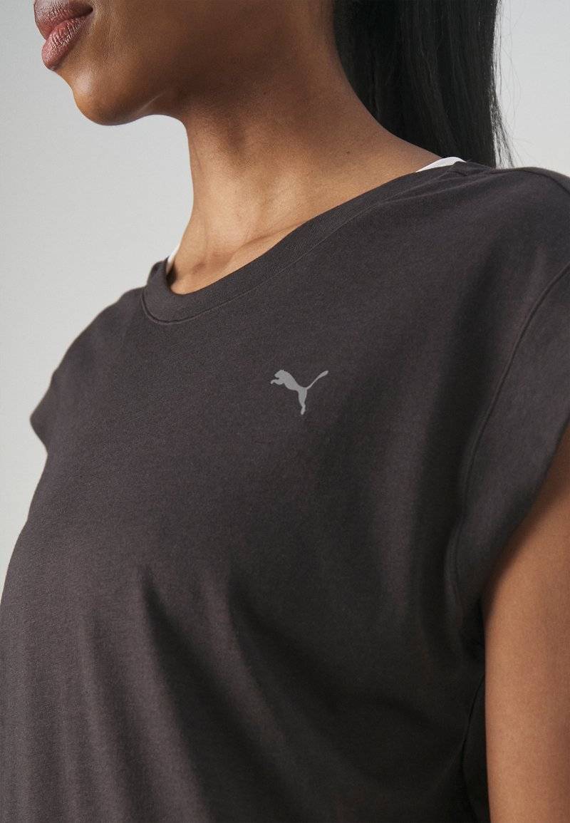 Puma Puma STUDIO FOUNDATIONS TEE - Sports T-shirt - black Cyber Monday