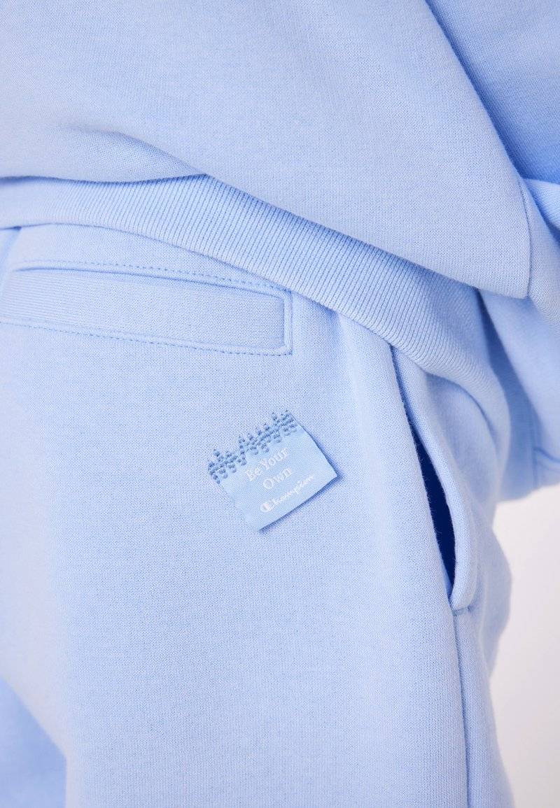 Champion Champion EXCLUSIVE PANT UNISEX - Tracksuit bottoms - light blue Letzte 2 Tage