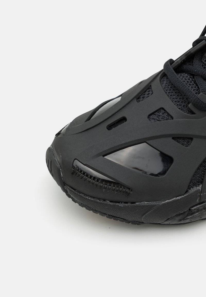 adidas by Stella McCartney adidas by Stella McCartney ADIDAS BY STELLA MCCARTNEY SOLAR GLIDE - Competition running shoes - core black Letzter Tag