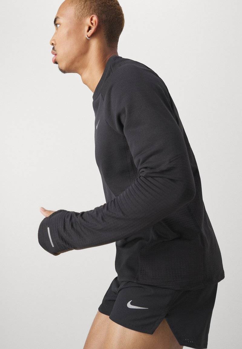 Nike Performance Nike Performance FAST SHORT - Sports shorts Begrenzt auf 3 Tage