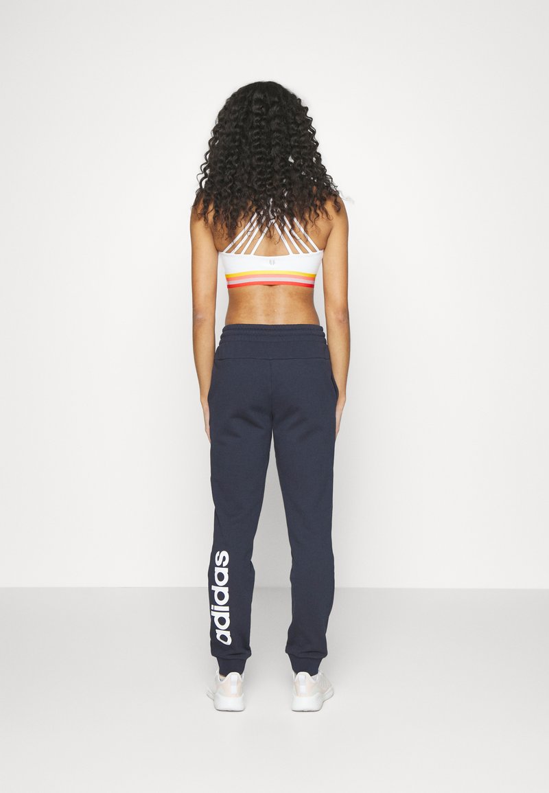 adidas Sportswear adidas Sportswear ESSENTIALS LINEAR CUFFED - Tracksuit bottoms - legend ink Black Friday Preise