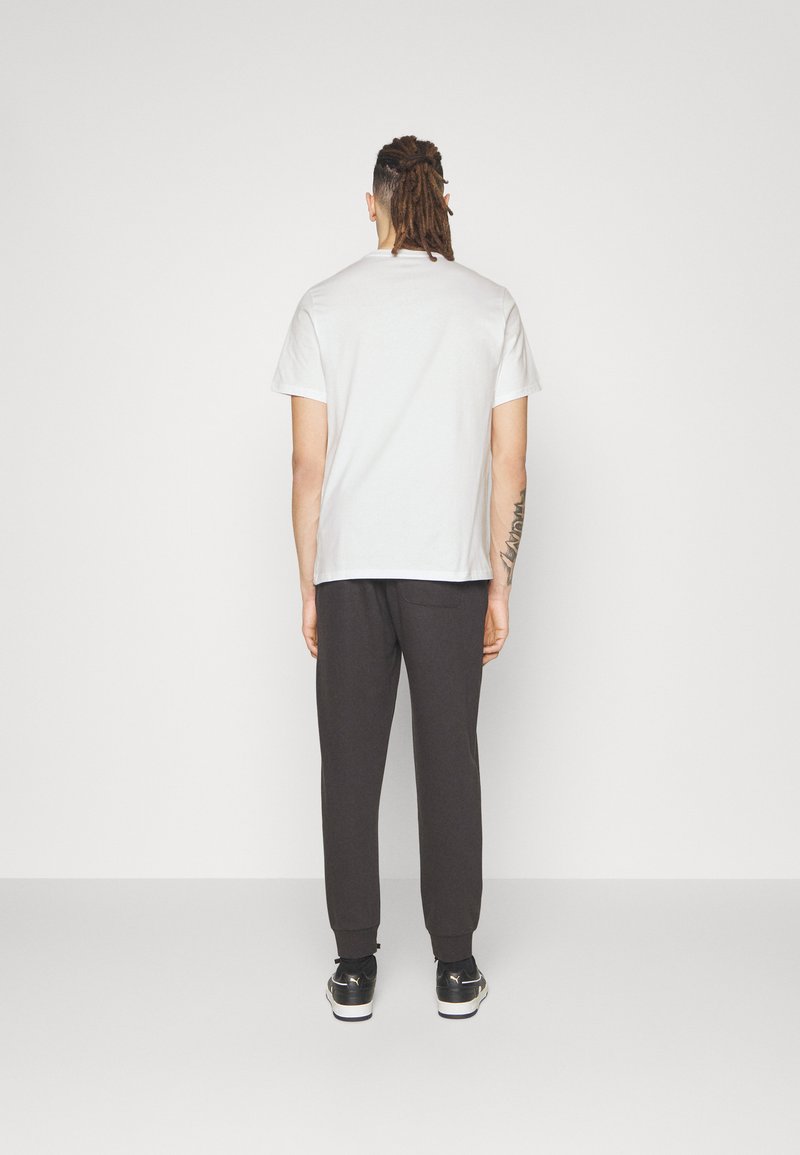 Converse Converse GO TO STAR CHEVRON TEE UNISEX - Print T-shirt - white Hotsell