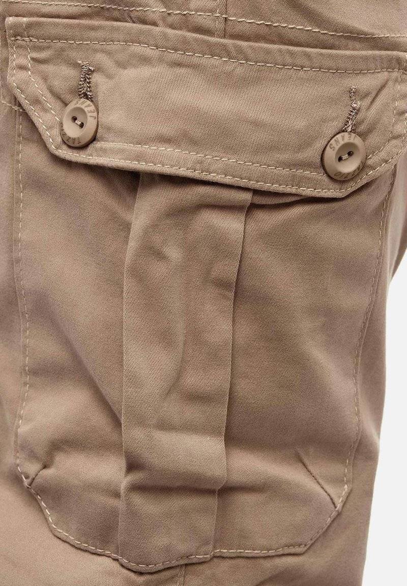 Tazzio Tazzio Cargo trousers - beige Verkauf