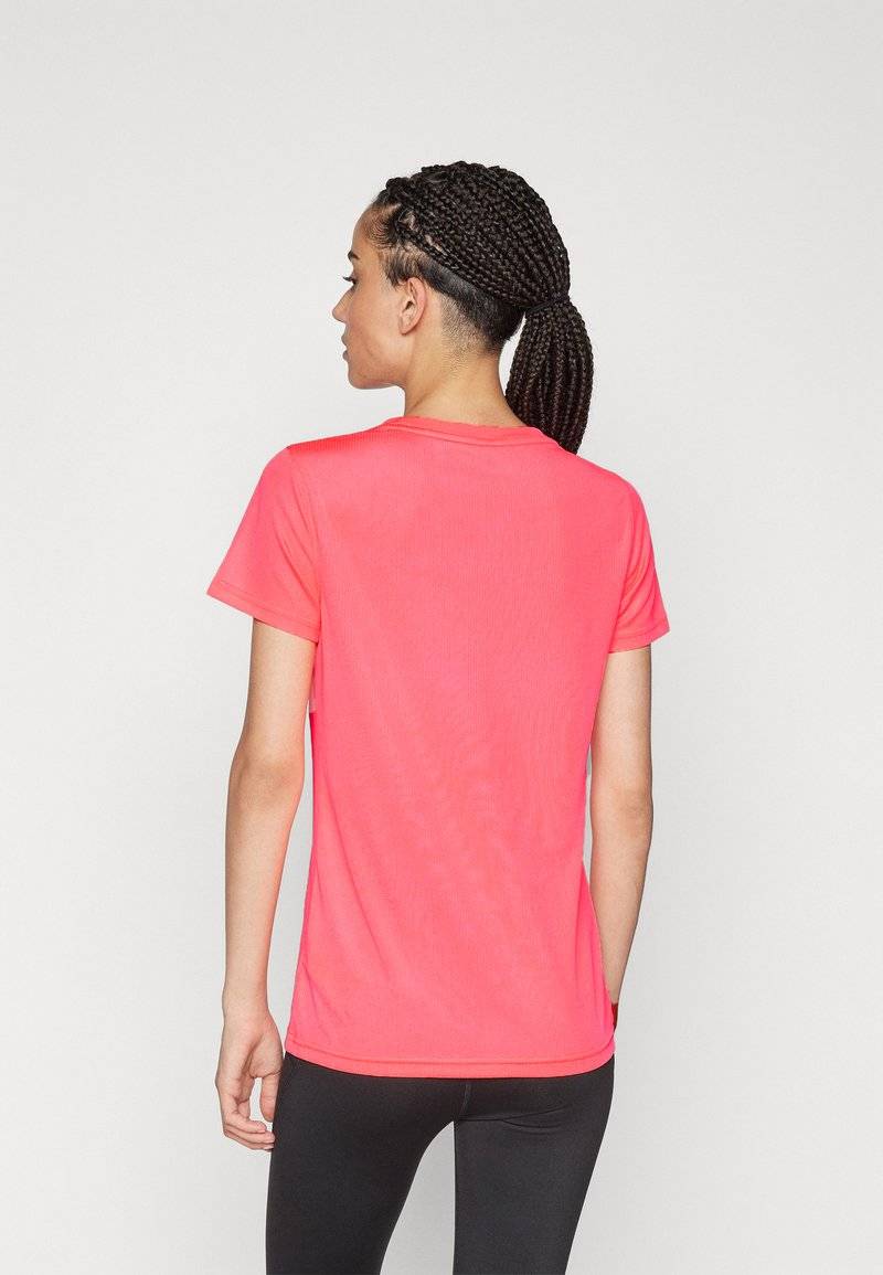 Puma Puma PERFORMANCE TEE - Sports T-shirt - sunset glow Flash Sale