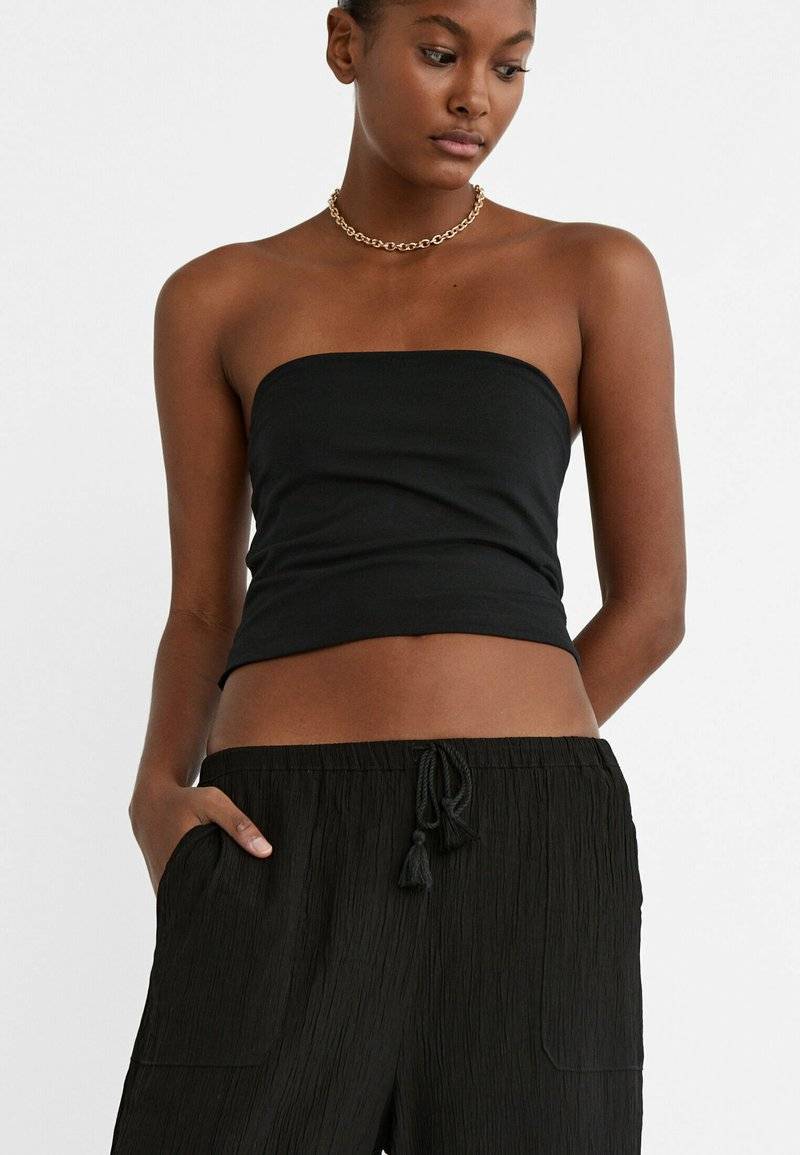 Stradivarius Stradivarius FLOWING CULOTTES - Trousers - black Online Shopping