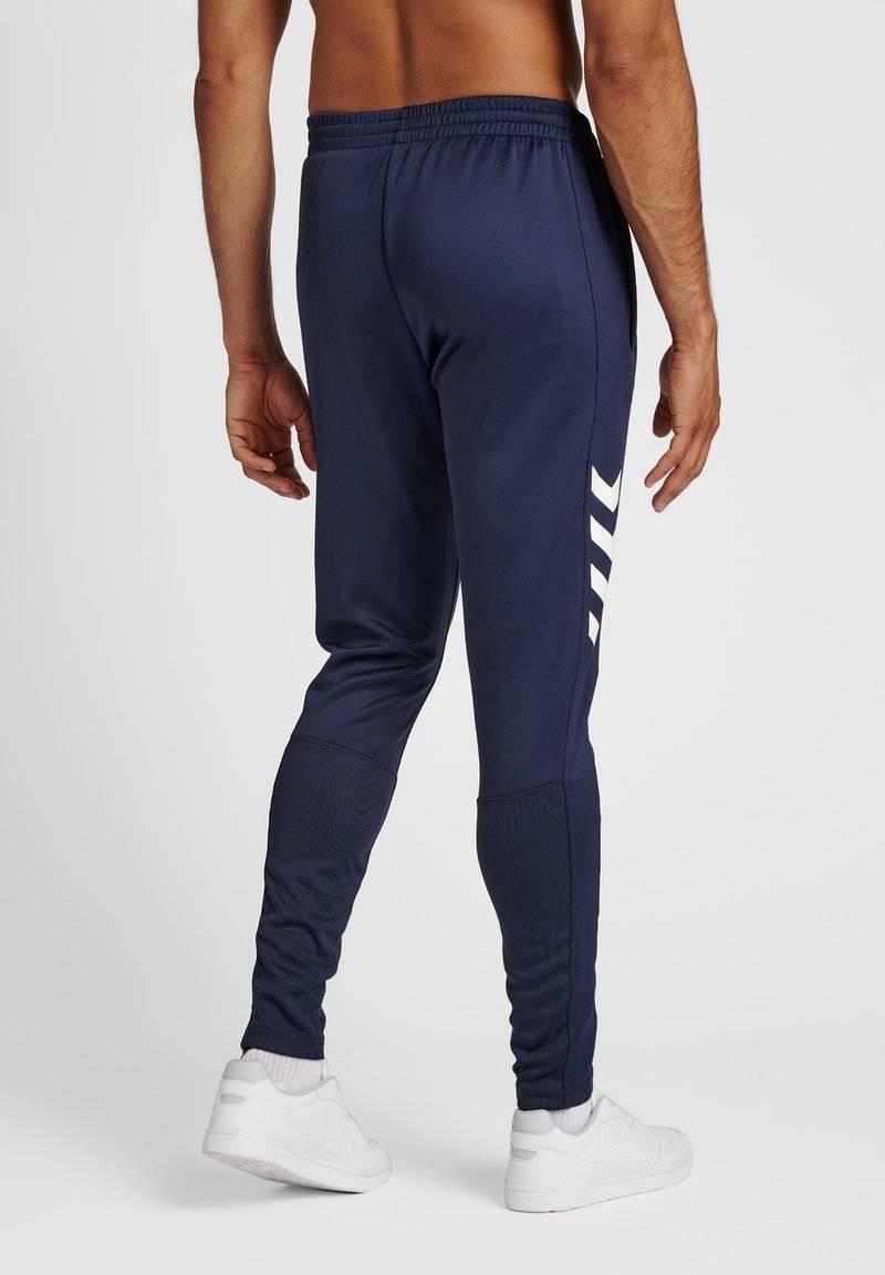 Hummel Hummel CORE XR TRAINING PANTS - Tracksuit bottoms - marine Osterangebot