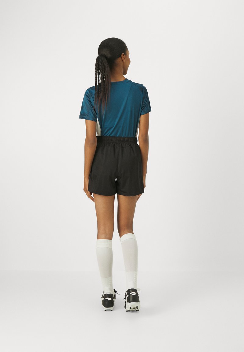Puma Puma TEAMGOAL SHORTS - Sports shorts - black Valentinstagsangebot